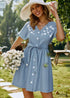 Minivestido azul con estampado floral navideño